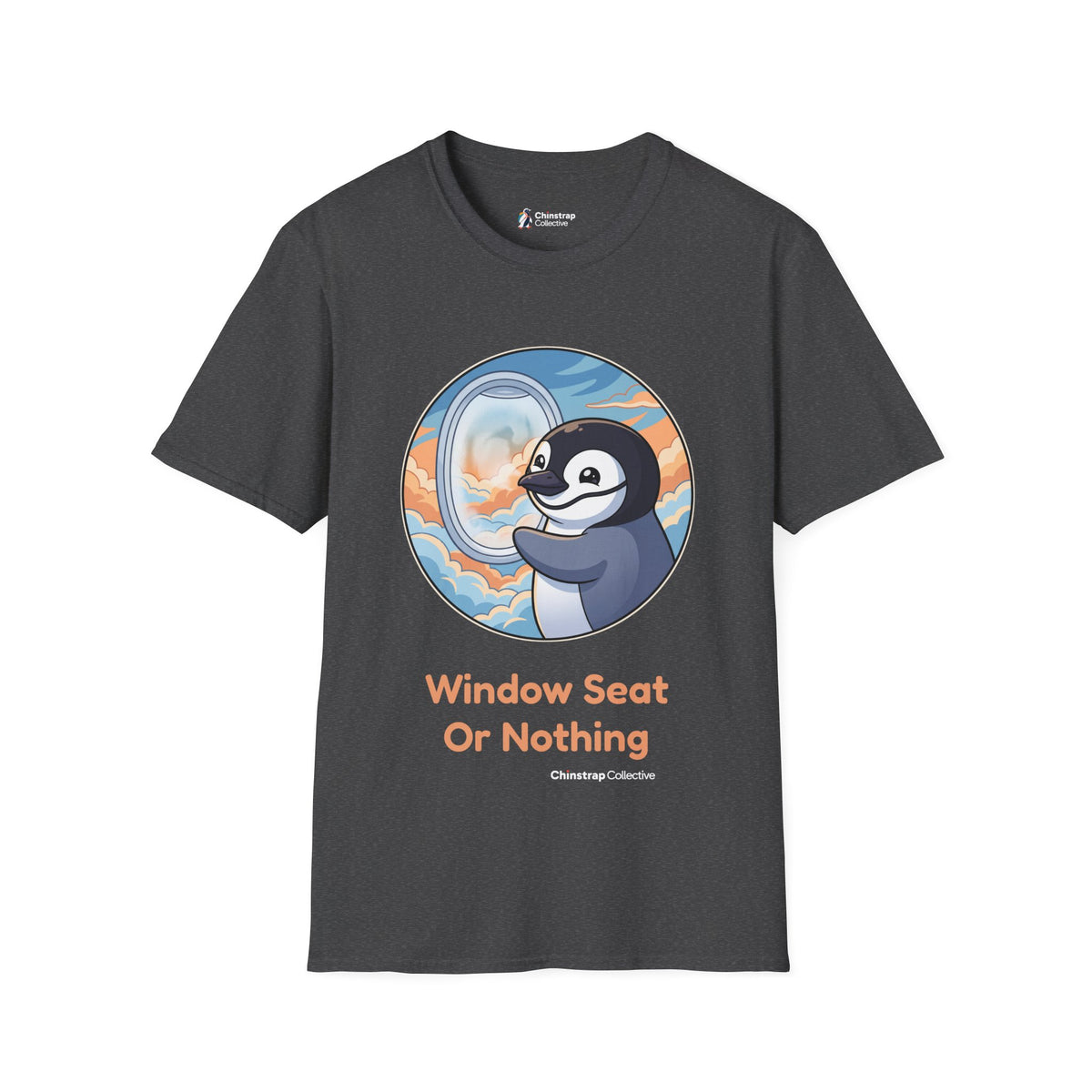 Window Seat penguin T-shirt in Dark Heather: A cartoon chinstrap penguin beside a round airplane window full of peach and…
