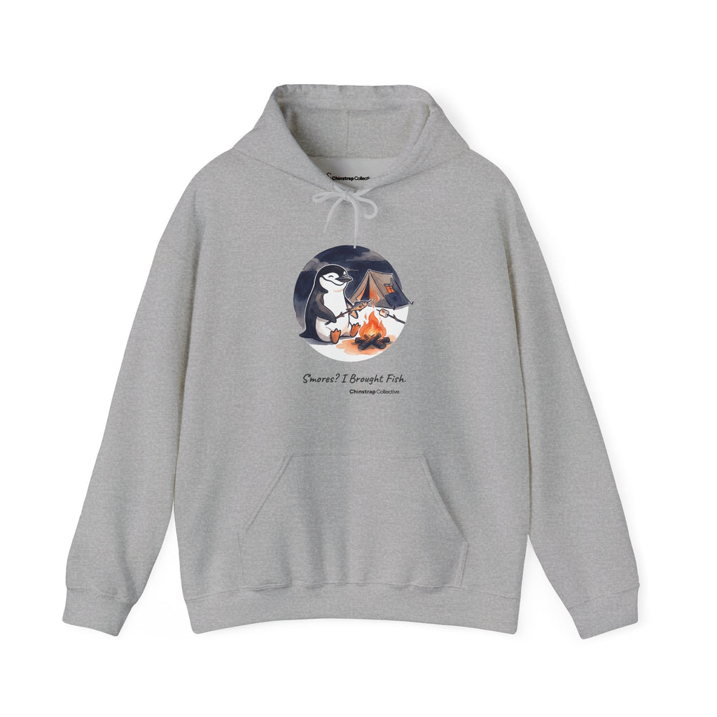 Campfire Fish penguin hoodie in Sport Grey: The chinstrap penguin sits by a low campfire at night, roasting a small fish