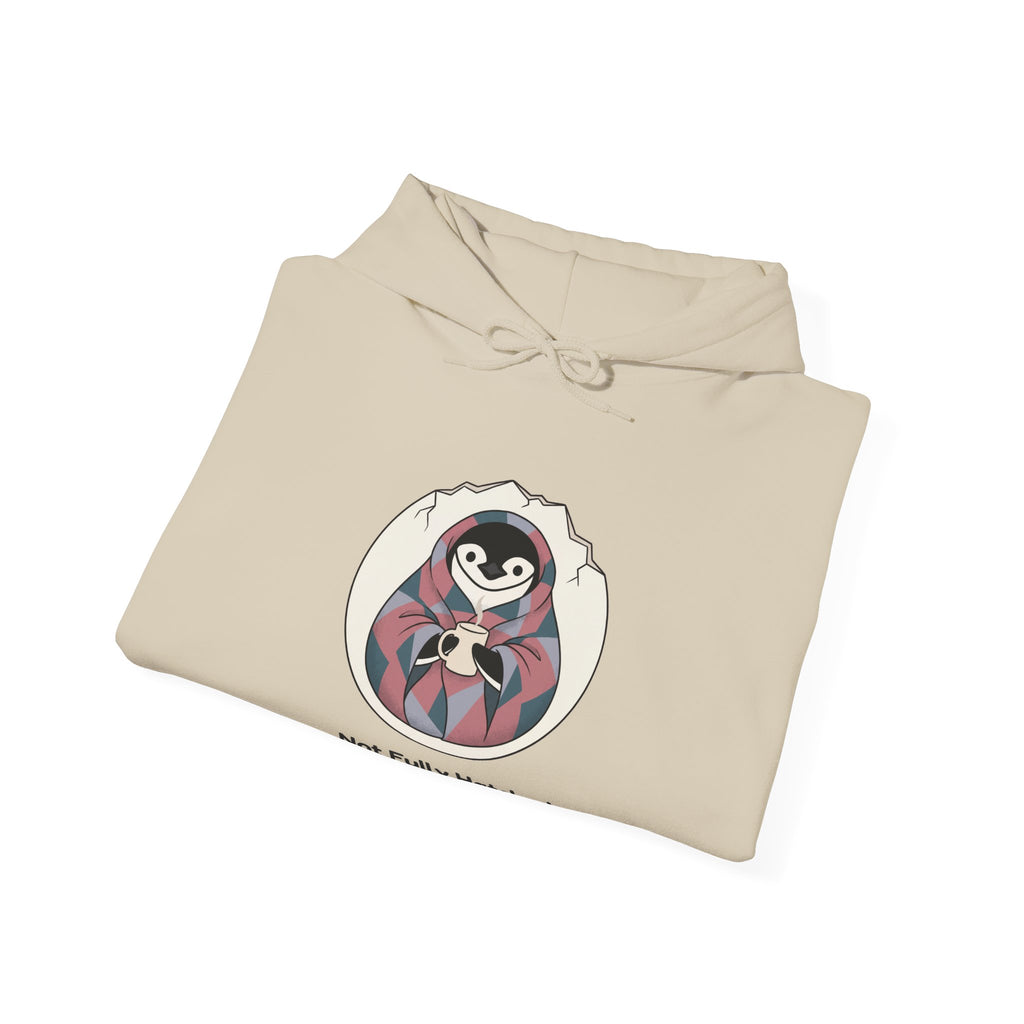 The Not Fully Hatched hoodie in Sand, folded