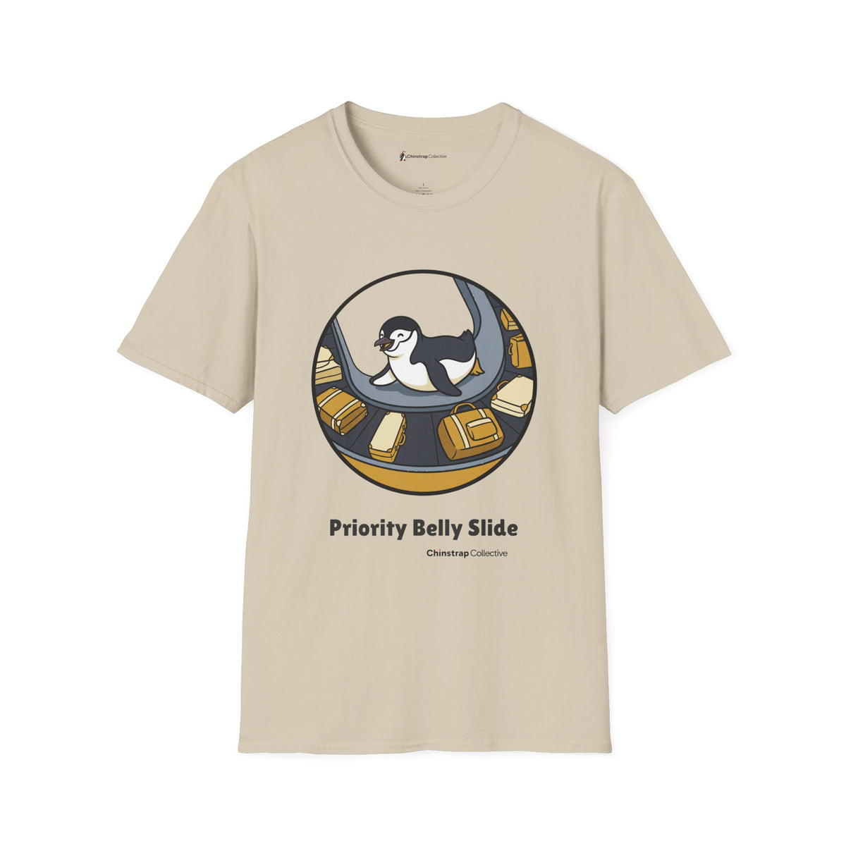 Priority Belly Slide penguin T-shirt in Sand: Inside a round frame, the penguin belly-slides along an airport luggage…