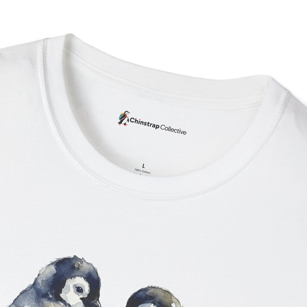 The Chinstrap Collective neck label on the Sandcastle Penguin Chicks T-shirt in White