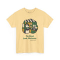 The Usual penguin T-shirt in Yellow Haze: Inside a green and gold sticker-style frame, the penguin in a green scarf…