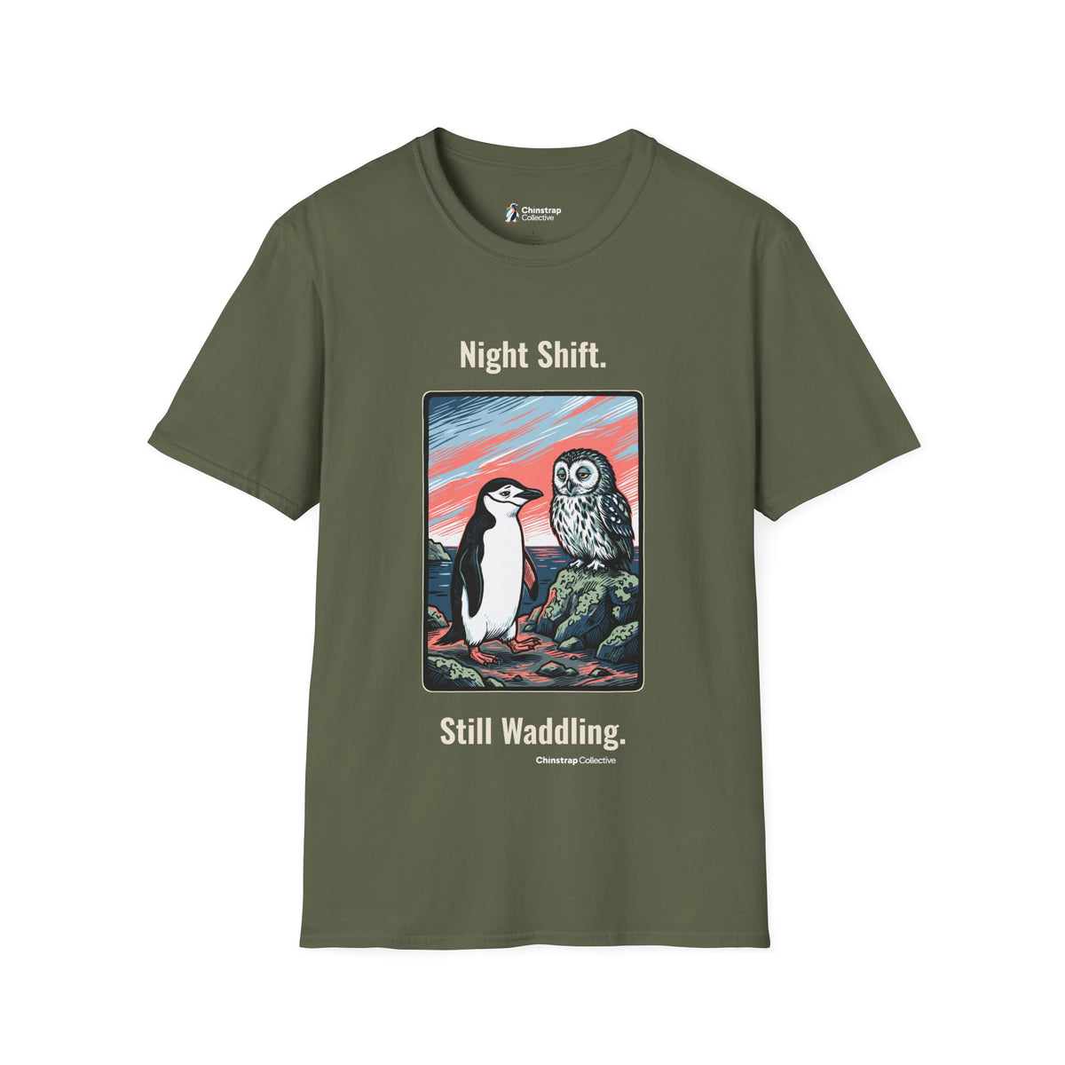 Still Waddling penguin T-shirt in Military Green: The art shows the chinstrap penguin on the rocky shore at dawn, trading…