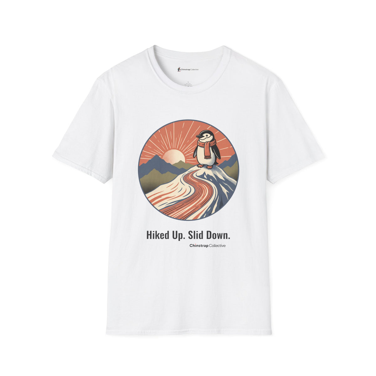 Hiked Up penguin T-shirt in White: Under a rising sun with fanned rays, the penguin in an orange scarf stands