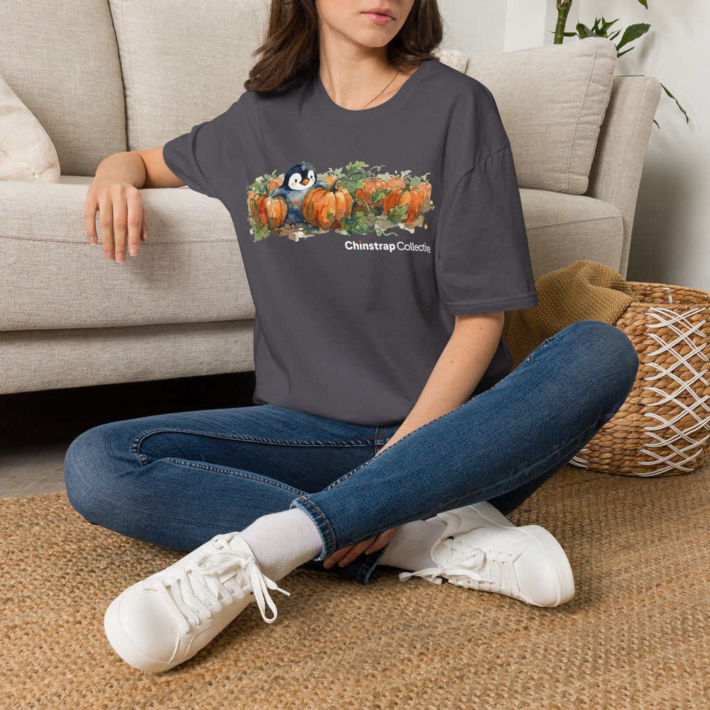 The Penguin Pumpkin Patch T-shirt in Charcoal, worn outdoors