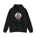 Not Fully Hatched penguin hoodie in Black: Wrapped in a round eggshell white blanket with a jagged cracked rim, the…