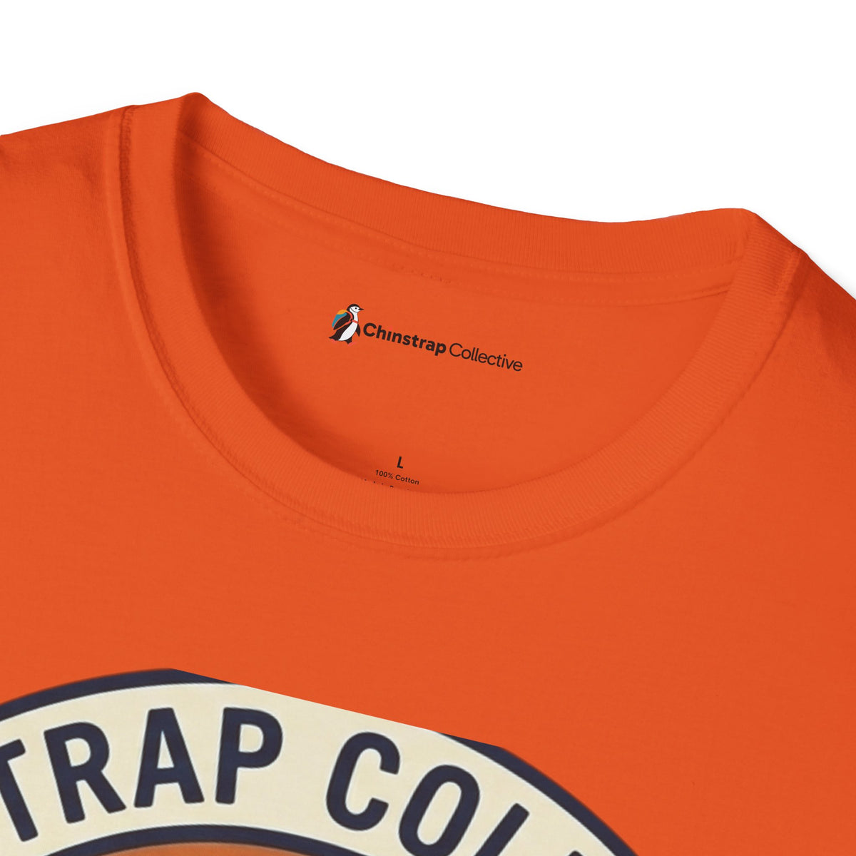 The Chinstrap Collective neck label on the Penguin Patch T-shirt in Orange