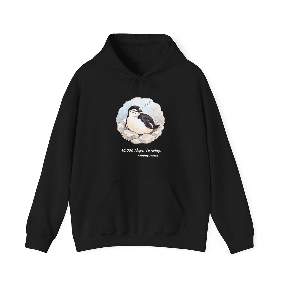Professional Napper penguin hoodie in Black: On its rocky nest the chinstrap penguin nods off mid-blink, with a trail of…