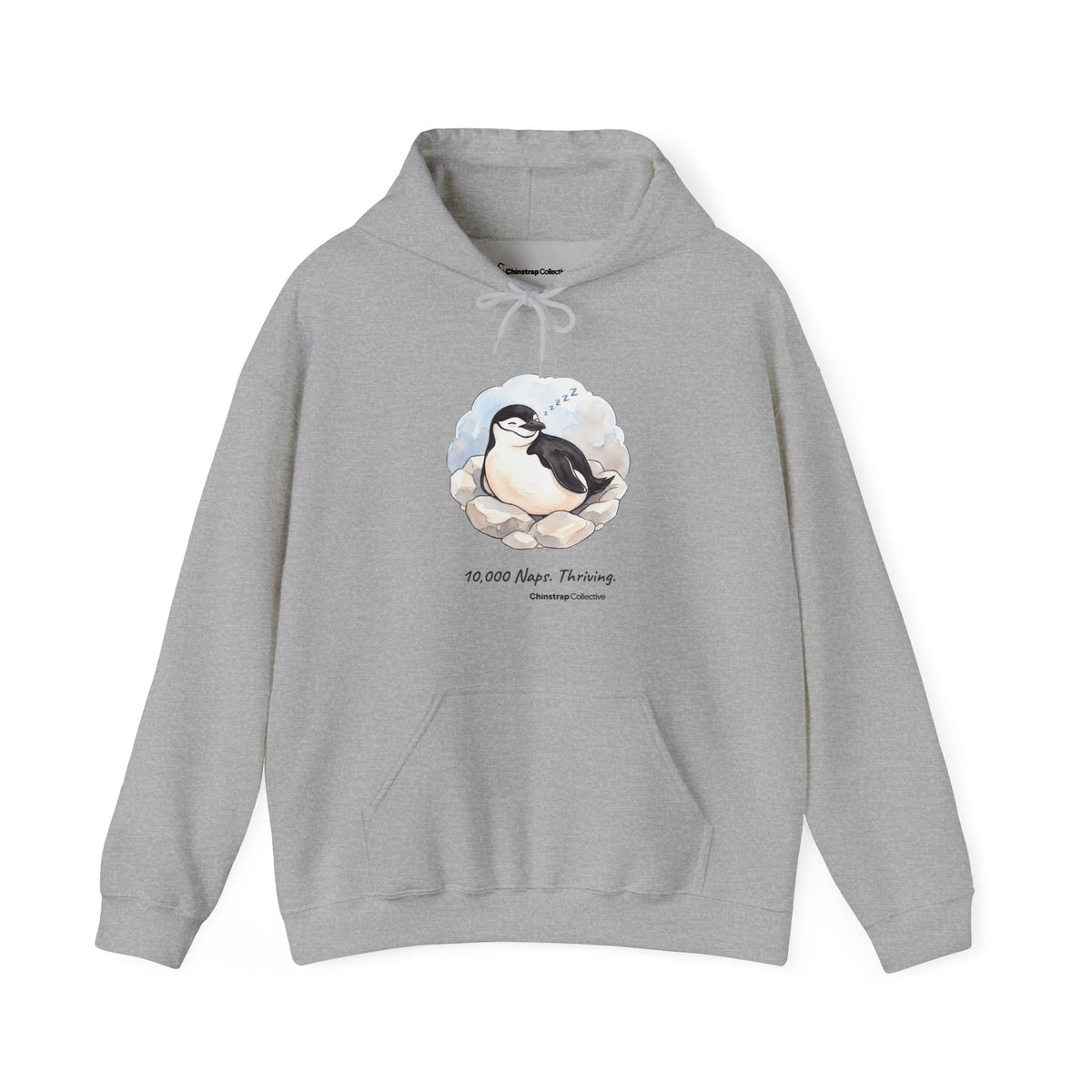 Professional Napper penguin hoodie in Sport Grey: On its rocky nest the chinstrap penguin nods off mid-blink, with a trail…