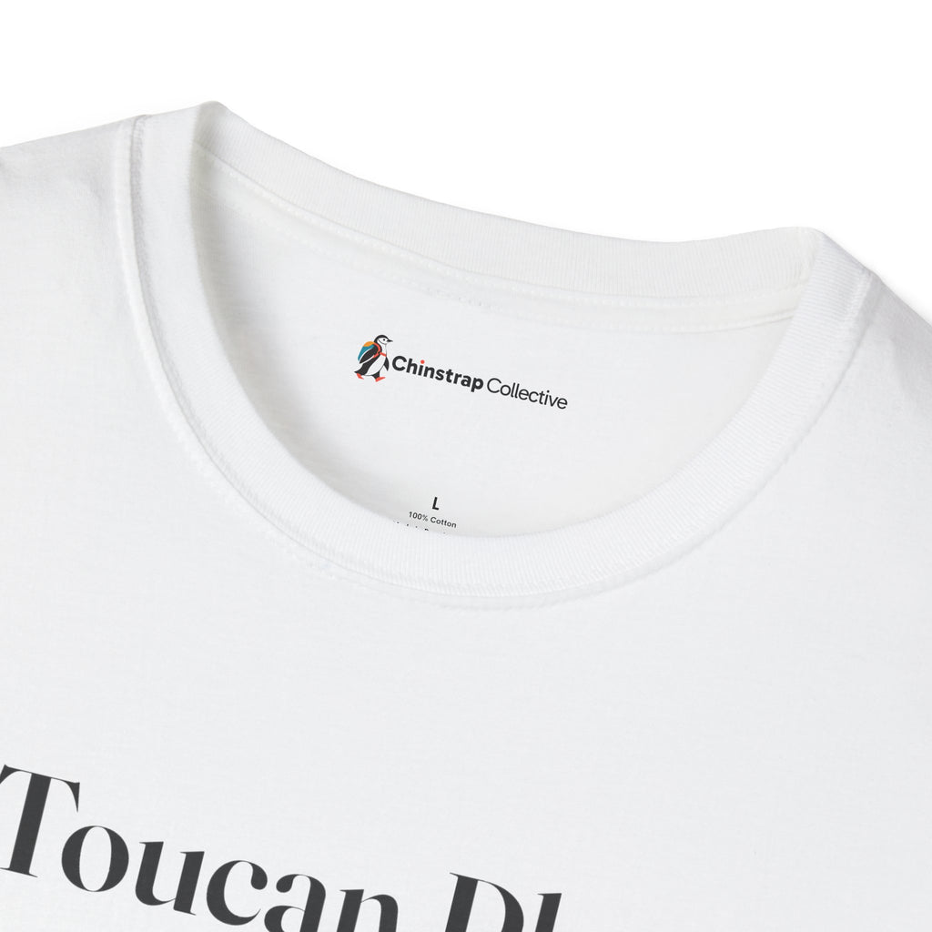 The Chinstrap Collective neck label on the Toucan Play That Game T-shirt in White