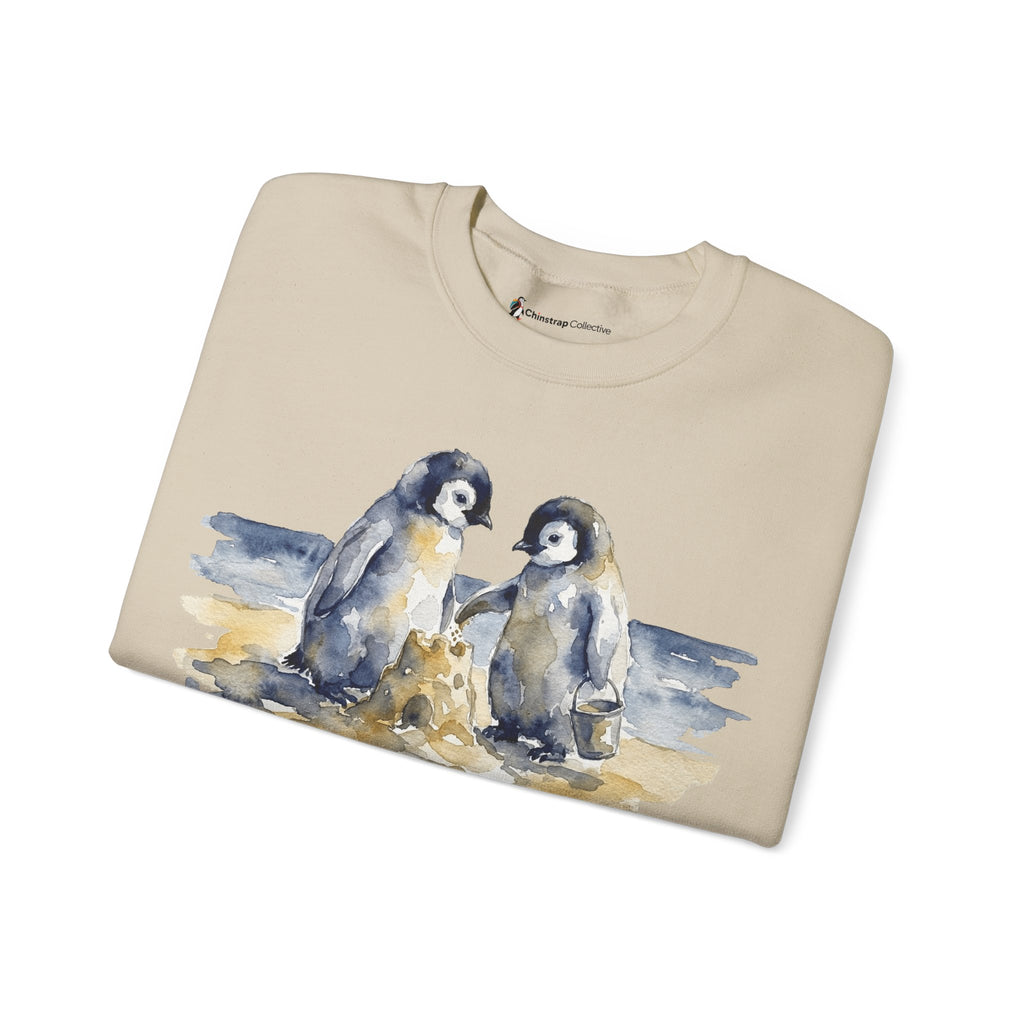 The Sandcastle Penguin Chicks sweatshirt in Sand, folded