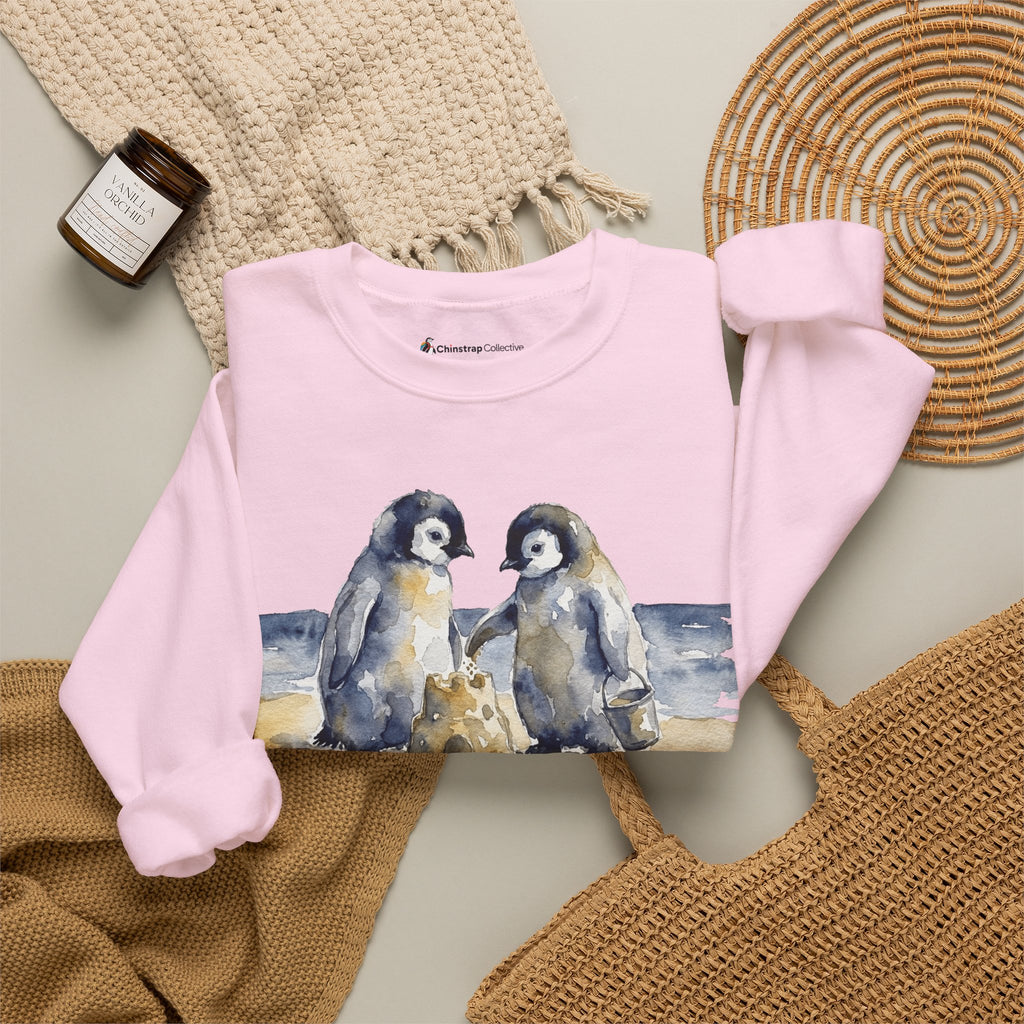 The Sandcastle Penguin Chicks sweatshirt in Light Pink, folded
