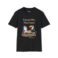 Toucan Play That Game penguin T-shirt in Black: The penguin and a bright toucan sit on stone stools at a stone…