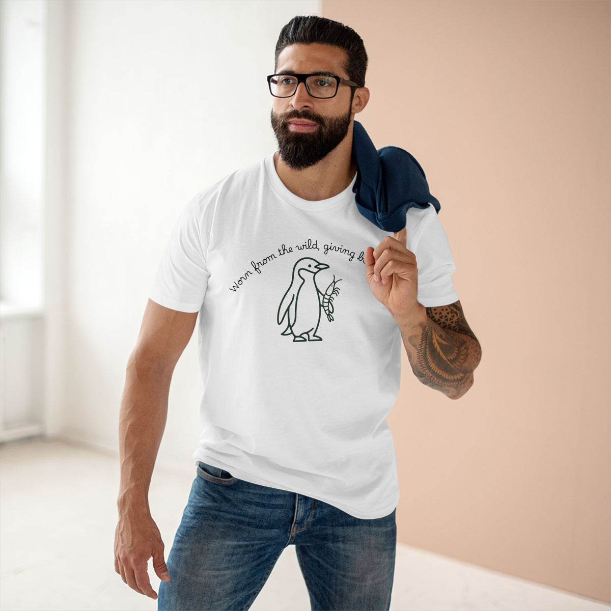The Penguin and Krill T-shirt in White, worn outdoors
