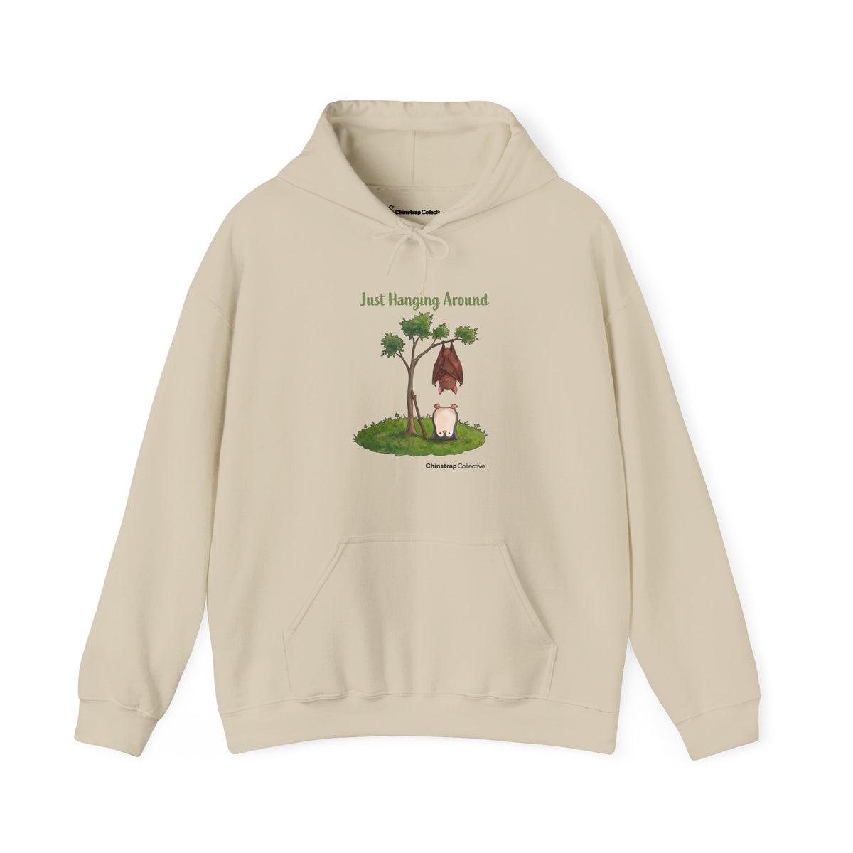 Just Hanging Around penguin hoodie in Sand: A bat hangs upside down from a leafy tree while the penguin does a headstand…