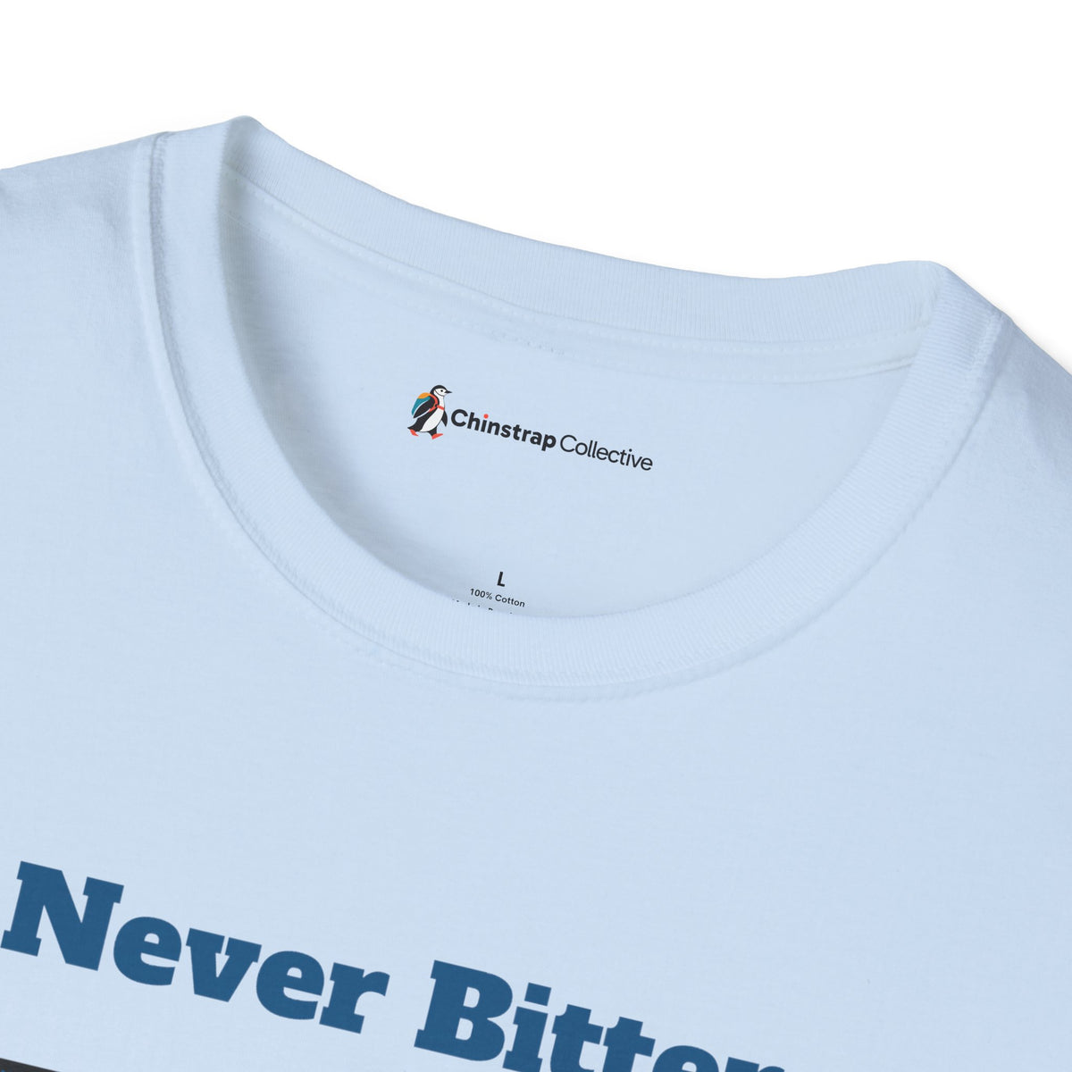 The Chinstrap Collective neck label on the Never Bitter T-shirt in Light Blue