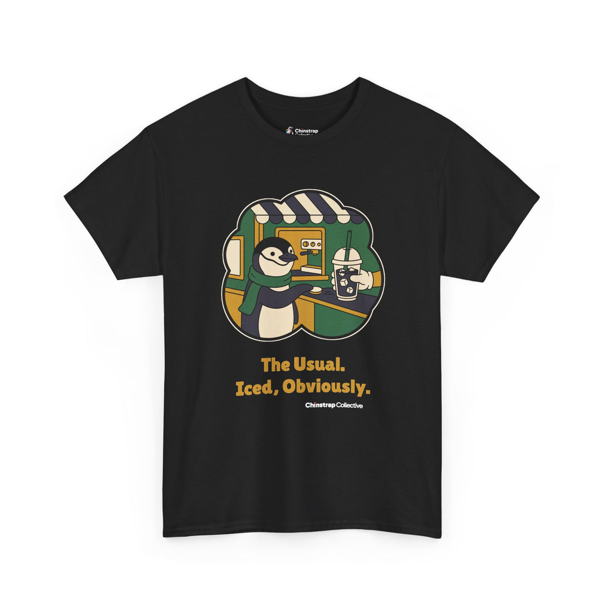 The Usual penguin T-shirt in Black: Inside a green and gold sticker-style frame, the penguin in a green scarf slides a…