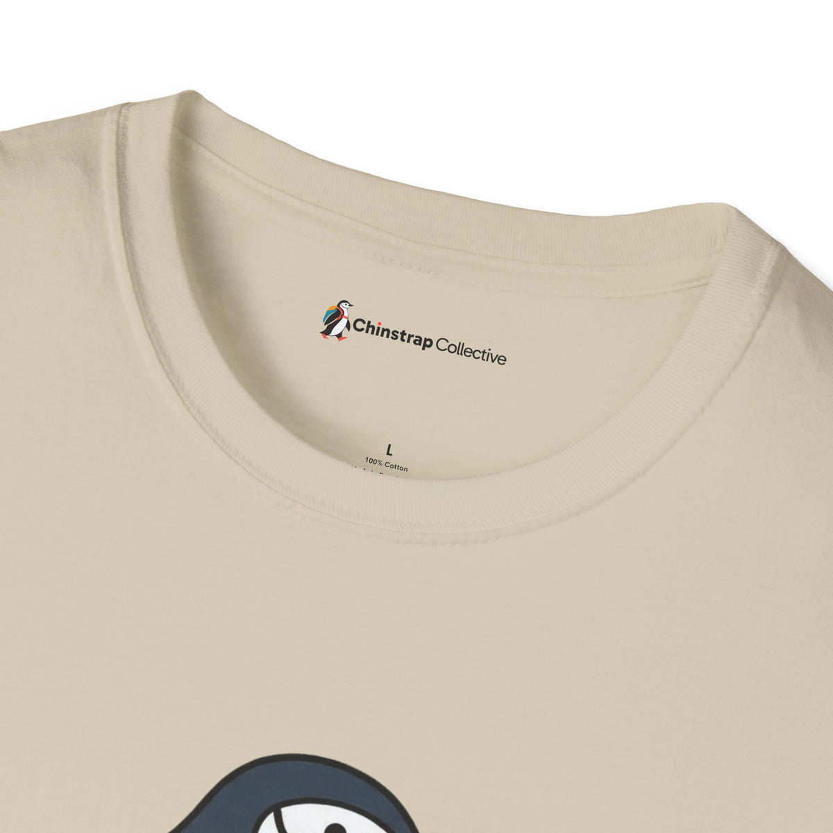 The Chinstrap Collective neck label on the Ultimate Disc Chinstrap T-shirt in Sand